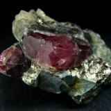 Large (22mm), red spinel crystal and one crystal smaller behind it in matrix rock, from Gem spinel deposit, Kuhi-lal, Pyandzh River Valley, Pamir Mts, Viloyati Mukhtori Gorno-Badakhshan, Tajikistan

Size 55 x 38 x 18 mm (Author: olelukoe)