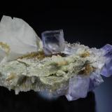 A paragenesis not easy to found in Emilio mine. Fluorite, calcite and Quartz. The fluorite crystals have 1.5 cm of edge.
Jeff Scovil photo. (Author: jrg)