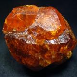 Spessartine crystal, from Nani, Loliondo, Arusha Region, Tanzania

Size 60 x 60 x 53 mm (Author: olelukoe)