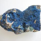 Deep blue azurite crystals forming a layer on quartz. In the 1960s and 1970s samples of this quality were not that rare on the dumps of the Glücksrad mine, Oberschulenberg, Harz mtns. Sample width approx. 10 cm. (Author: Andreas Gerstenberg)