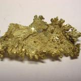 Oro, mina Round Mountain, Nye Co., Nevada, USA, 3,9x1,9x0,7 cm. (Autor: Edelmin)