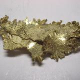 Oro, mina Round Mountain, Nye Co., Nevada, USA, 3,9x1,9x0,7 cm. (Autor: Edelmin)