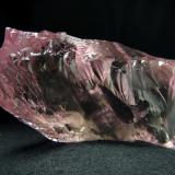 Super gemmy, undamaged, naturally etched  floater crystal of  Kunzite,  from Urucum Mine, Galileia, Minas Gerais, Brazil

Size 70 x 40 x 20 mm (Author: olelukoe)