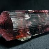 Tourmaline Rubellite, covered with a crust of stilbite crystals. Russia, Chitinskaya oblast., Sosedka pegmatite vien, Malkhan

Size is: 77 x 40 x 40 mm (Author: olelukoe)