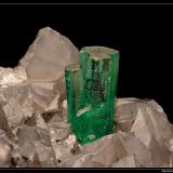 Beryl variety Emerald 
La Pita Mine, Maripí, Boyacá, Colombia
5-6 mm on calcite (Author: ploum)