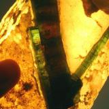 The main crystal (width 17 mm) held against a light source. The red colour of the inner crystal comes apparent. Compare this to the normal pictures taken in daylight where the crystals are simply greenish-blue (see my previous post). (Author: Tobi)