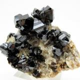 Cassiterite, quartz
Viloco Mine (Araca mine), Loayza Province, La Paz Department, Bolivia
83 mm x 72 mm x 49 mm. Main cassiterite crystal: 17 mm tall, 16 mm wide (Author: Carles Millan)