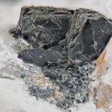 Annite from Poudrette quarry (Demix quarry; Uni-Mix quarry; Desourdy quarry), Mont Saint-Hilaire, Rouville RCM, Montérégie, Québec, Canada
FOV=5mm (Author: Doug)