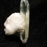 Fluorapophyllite on ’mesolite’
Moonen Bay, Isle of Skye, Scotland, UK
Crystal 23 mm

Apophyllite crystal 23mm on ’mesolite’. Self-collected 1994 from Moonen Bay, Isle of Skye. (Author: Mike Wood)