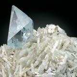 Topaz on Albite, Little Three Mine, Main Dike, Ramona District. Topaz crystal is 3.5 cm tall. (Author: Jesse Fisher)