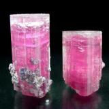 Elbaite, Stewart Mine, Pala, San Diego County. 3.8 and 3.2 cm tall. Collected around 1980. (Author: Jesse Fisher)