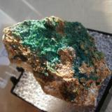 Libethinite (grass green) on Chrysocolla, South Rim Pit, Tyrone Mine, Grant County, NM - thumbnail. (Author: Darren)