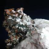 Copper in quartz.  
Pine Mountain, Adams Co., the mass of copper is about 3 cm across. (Author: John S. White)