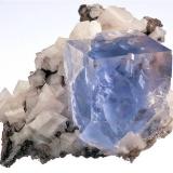 Light blue fluorite on Dolomite from Walworth, New York.  Measures 3.2 x 4.6 x 4 cm and weighs 40 grams. (Author: VRigatti)
