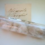 Kieserite in glass vial (10 cm) from Staßfurt, Saxony-Anhalt (type locality). Ex William S. Vaux collection. (Author: Andreas Gerstenberg)