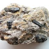 Augite crystals in gneiss matrix from Sayda, Saxony. Specimen width: 8,5 cm. (Author: Andreas Gerstenberg)