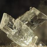 Epistilbite with Quartz and Chabazite
Puu o Ehu Quarry, Kailua, Oahu Island, Honolulu Co., Hawaii, USA
Field of view: 3.9 mm.
Specimen size: 5 x 5 x 3 cm.
Photo: Volker Betz (Author: Jordi Fabre)