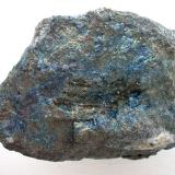 Massive berthierite with characteristic blue tarnish. 9 cm rich ore sample from Heinrich Stehender vein, 13th level, Alte Hoffnung Gottes mine, Kleinvoigtsberg near Freiberg, Saxony. (Author: Andreas Gerstenberg)