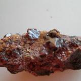 CinabrioMina El Entredicho, Almadenejos, Comarca Valle de Alcudia, Ciudad Real, Castilla-La Mancha, España0,4 cm. los cristales (Autor: javier ruiz martin)