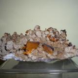 Wulfenite xls on Calcite
Mina La Erupción-Ahumada, Los Lamentos, Ahumada, Chihuahua, Mexico
84x37x45mm       Bigger xls  12 -13mm (Author: Carlos M.)