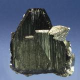 Ferberite with Arsenopyrite
Yaogangxian Mine, Yizhang, Chenzhou, Hunan, China 
Specimen Size: Cabinet

Specimen: William Pinch Collection
Photo: Jeff Scovil & The RRUFF Project (Author: Pinch Bill)