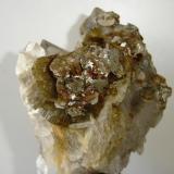 Siderite (greenish), dolomite (white), quartz and pyrrhotite (golden)
Morro Velho mine,  Nova Lima, Iron Quadrangle, Minas Gerais, Brazil
11 x 10 x 8 cm (Author: Anísio Cláudio)