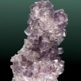 Fluorita
Caravia Baja, Caravia (concejo), Asturias. San Lino (m).
Agregado de cristales tetrahexaédricos de color violeta azulado (ejemplar de 1980).
6,9 x 4,6 x 3,6 cm. (Autor: Carles Curto)