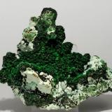 Malaquita cristalizada con Crisocola
Mina Rokana, Kitwe, Zambia
Tamaño de la pieza: 11.2 × 9 × 2.6 cm.
El cristal más grande mide: 0.2 × 0.2 cm.
Foto: Ejemplares de Referencia (Autor: Jordi Fabre)