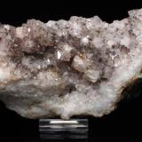 Goethita, Cuarzo
Amerzgane, Ouarzazate, Marruecos
Tamaño de la pieza: 19,4 × 9,8 × 6,2 cm.
Los cristales de goethita forman abanicos que sobresalen hasta 8 mm desde los cristales de cuarzo. (Autor: Iván Blanco (PDM))
