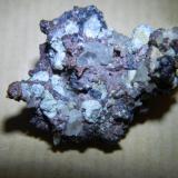 Cobre nativo y cuprita
Tierra Amarilla, Copiapó, Chile
3 x 3 cm (Autor: Toni Iborra)