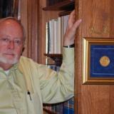 William W. Pinch posing with his medal that he won, it was the first edition of the trophy (Author: Pinch Bill)