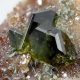 Epidote
Viù, Viù Valley, Lanzo Valley, Sesia-Lanzo zone, Torino Province, Piedmont, Italy
4.69 mm group of geminated green Epidote crystals (Author: Matteo_Chinellato)