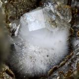 Analcime
Vitiello Quarry (Cava Vitiello), Terzigno, Mt Vesuvius, Somma-Vesuvius Complex, Naples Province, Campania, Italy
Little Analcime crystal over a not well know Zeolite group tuft mineral. All measure 2.5 mm (Author: Matteo_Chinellato)