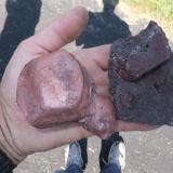 hematite @ pyrite? L-main pit, R-other pit
Graves Mt., Lincoln Co., Georgia (Author: John Medici)