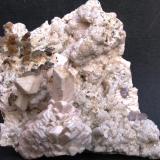 Ortoclasa con Fluorita.
Formacion Papachacra. Belén. Catamarca. Argentina.
Tamaño:14x12 cm. (Autor: Jose Luis Otero)