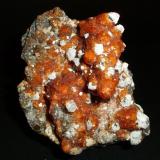 Spessartina (Espesartina) (Granate) sobre Cuarzo y matriz de Ortosa
Tongbei, Yunxiao Co., Zhangzhou, Fujian, China
9.8 x 9.7 x 5.3 cm (Autor: Daniel Olivares)