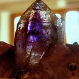 Amethyst
Brandberg, Erongo Region, Namibia
Main crystal (height 25 mm)

Additional picture to show the sharp-edged zoning of the main crystal in back light. (Author: Tobi)