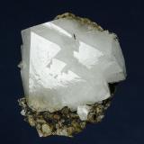 Quartz
Second Sovietskiy Mine, Dal’negorsk, Primorskiy Kray, Russia
71.0 x 68.0 x 46.0 mm

A complex, highly lustrous, opaque crystal of bright white Quartz measuring 68 x 59 x 36 mm is nicely perched on a perfectly trimmed, iron-stained matrix. No damage. (Author: GneissWare)