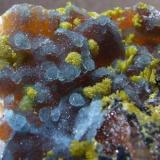 Plumbogummite, Mimetite, Quartz, Limonite and  Manganese Oxides
Dry Ghyll, Caldbeck Fells, Cumbria.
FOV approx 20 x 20 mm (Author: nurbo)