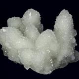 Quartz
Huanggangliang Iron Mine, Kèshíkèténg Qí, Chifeng, Inner Mongolia A.R., China
92.0 x 69.0 x 60.0 mm
Highly lustrous, clear glassy Quartz crystals to 65 x 26 mm, some doubly terminated, are nearly completely covered with a second generation of 1 to 2 mm lustrous, glassy Quartz creating a very sparkly display. No damage. (Author: GneissWare)