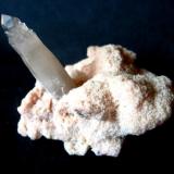 Quartz on rhodochrosite
Cavnic (Kapnic; Kapnik), Maramureș Co., Romania
Lenght of the quartz crystal 35 mm (Author: Tobi)