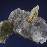Calcite included with pyrite with Muscovite
Rist Mine, Hiddenite, Alexander Co., North Carolina, USA
6.3 x 6 cm. (Author: am mizunaka)