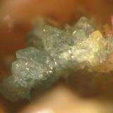 Scorodite
Schneckenstein, Falkenstein, Vogtland, Saxony, Germany.
2 mm aggregate
The well-crystallized scorodite in detail. (Author: Andreas Gerstenberg)