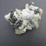 Sphalerite on quartz
Westfield, Hampden Co., Massachusetts, USA
7 cm. (Author: vic rzonca)