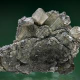 Calcite on Muscovite
Rist Mine, Hiddenite, Alexander Co., North Carolina, USA
8.5 x 6.3 cm. (Author: am mizunaka)