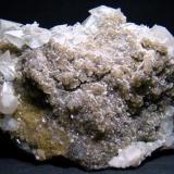 Fluorita con Calcita y Dolomita
Mina Moscona, Solís, Corvera, Asturias, España.
15x12x6 cm
Cristales de Calcita de hasta 3 cm. (Autor: D.N.S.Borràs)