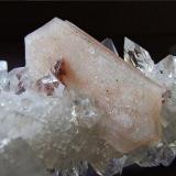 Stilbite on Apophylite,
Poona, Deccan Plateau, India.
Stilbite crystal 28 mm across. (Author: nurbo)