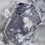 Galena
Poudrette quarry (Demix quarry; Uni-Mix quarry; Desourdy quarry; Carrière Mont Saint-Hilaire), Mont Saint-Hilaire, Rouville RCM, Montérégie, Québec, Canada
FOV=3.5mm
The white crystals on the galena are gonnardite (Author: Doug)