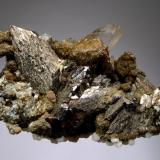 Arsenopyrite
Panasqueira Mines, Covilha, Castelo Branco Dist., Portugal
5.1 x 9.3 cm.
Bright arsenopyrite xls. associated with siderite, quartz, and spherical calcites on the bottom. (Author: crosstimber)