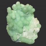 Prehnite and calcite
McBride Avenue and Browertown Road Pumping Station, Woodland Park, Passaic Couny, New Jersey, USA
12 x 10 cm
From an excavation in 1986 which produced countless numbers of specimens of prehnite after anhydrite with a look different from those of other nearby localities. (Author: Frank Imbriacco)